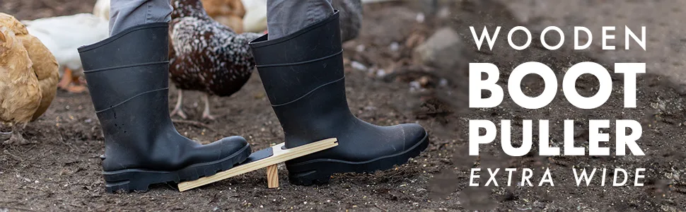 JobSite Boot Jack - Wood Boot Remover - Extra Wide Boot Puller for Taking off Boots 1 Pack - Person using boot puller on muck boots with chickens in background