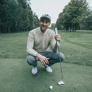 Vice Golf Drive White Golf Balls - Vice Golf player sitting