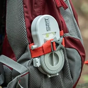 Saltshot Swatter | Insect, Bug and Fly Swatter | Launch 150 MPH Salt Blasts | Portable, Pocket Sized, Patented Speed Loader - Saltshot Swatter secured to backpack