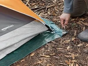 Amazon Basics Waterproof Camping Tarp 9.5' X 11.3' - Amazon Basics camping tarp to help keep ground water or rain off your tent