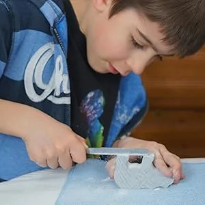 STUDIOSTONE CREATIVE Bear Soapstone Sculpture Stone Carving DIY Arts Crafts Kit Kids Adults - Boy carving soapstone bear animal with file