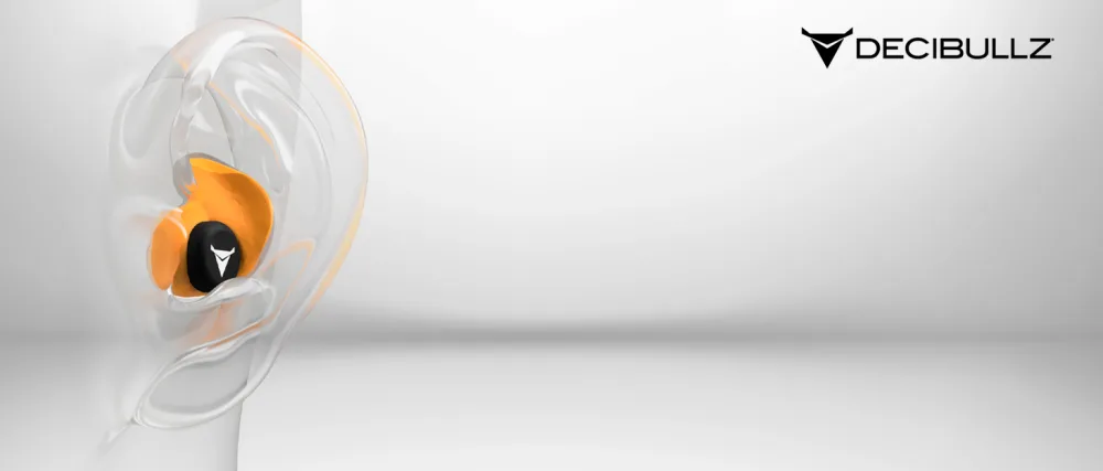 Decibullz - Custom Molded Security Radio Adapters, Thermo-Fit Earpieces Designed for Clear Acoustic Tube Radios (Awareness) - An orange Decibullz earplug in a human ear