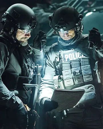 Nitecore Tip SE Black Keychain Flashlight, 700 Lumen USB-C Rechargeable EDC with LumenTac Keychain Light - 2 men suited up looking at plans