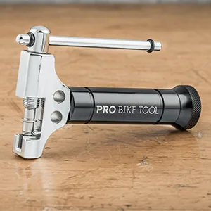 PRO BIKE TOOL Universal Chain Tool with Spare Pushing pin - Compatible with 8-12 Speed Chains Chain Splitter - Silver - Black Chain tool up close