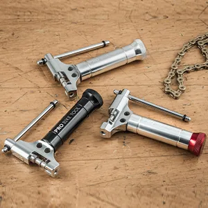 PRO BIKE TOOL Universal Chain Tool with Spare Pushing pin - Compatible with 8-12 Speed Chains Chain Splitter - Silver - Image showing all 3 colours: Red, Silver and Black
