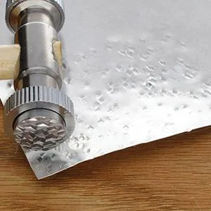 The Beadsmith Interchangeable Texture Hammer - Metal Elements - 9.5 inches, 75mm, 13.4oz Steel Head with Twelve 23mm Faces - Texturing Tool Used to Add Patterns & Dimension to Metalwork 23mm - 12 Faces - Textured Sheet Metal