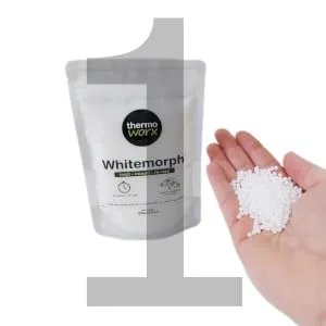 Thermoworx Whitemorph 2.2lb. Hand moldable bioplastic. Melt, Mold and Reuse - whitemorph pack with hand containing white pellets
