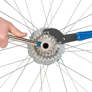 Park Tool FR-5.2H - Cassette Lockring Tool with Handle - Cassette lockring tool, chain whip and adjustable wrench removing a bicycle cassette lockring