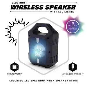 SOAR NFL Unisex ShockBox XL Wireless Bluetooth Speaker Chicago Bears One Size Team Color - Black speaker with handle and middle blue Seattle Seahawks logo on white picnic table with cellphone