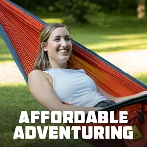 Wise Owl Outfitters Camping Hammock - Portable Hammock, Camping Accessories Single or Double Hammock for Outdoor, Indoor w/Tree Straps Black & Grey Large - Affordable adventuring young woman sitting in hammock stitched straps storage bag essential
