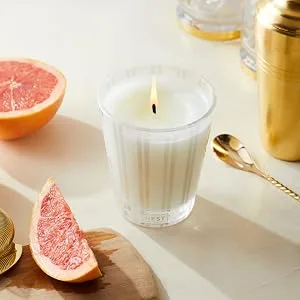 NEST New York Bamboo Scented Classic Candle Bamboo Classic Candle - Classic Candle surrounded by sliced grapefruit