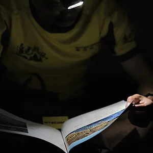 Nitecore NU33 Rechargeable Headlamp, 700 Lumen USB-C White, Red and Reading Lights, with Lumen Cable Organizer - Reading at night with the low light mode