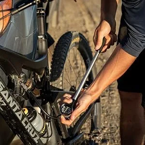 Topeak Pocket Shock DXG XL Bike Mini Pump, Long Version for Home/Shop use with dial Gauge 360 PSI/24.8 BAR - In Use 1