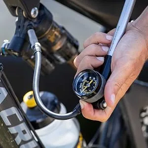 Topeak Pocket Shock DXG XL Bike Mini Pump, Long Version for Home/Shop use with dial Gauge 360 PSI/24.8 BAR - In Use 2