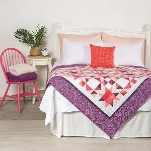 Connecting Threads Print Collection Precut 100% Cotton Quilting Fabric Bundle Fat Quarter (Hello Daisy) - colorful quilt displayed in a bedroom