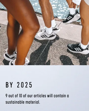 adidas Men's Training Pants Medium Black - adidas shoes on models in front of the ocean with adidas sustainability messaging