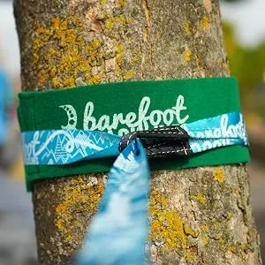 Barefoot Slackline Kit 60ft (18m) Complete Set Including, Ratchet, Training Line, Bark Protectors & Instructions! Designed for Both Kids & Adults - 3 Colors Available (Azure Blue) - Tree trunk wrapped with the barefoot protector
