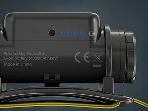 Nitecore NU50 1400 Lumen Headlamp, USB-C Rechargeable Lightweight Long Runtime for Camping, Running or Work, with Red Light and Lumentac Organizer - highlighting the power indicator on the bottom of the NU50