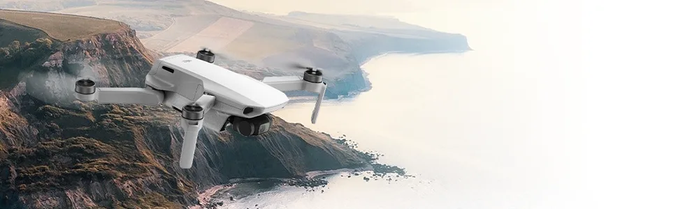 DJI Mavic Mini Combo Drone FlyCam Quadcopter with 2.7K Camera 3-Axis Gimbal GPS 30min Flight Time (Renewed) - Mavic Mini show flying over cliffs and the ocean