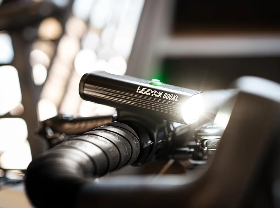 LEZYNE Micro Drive Pro 800XL LED Bicycle Headlight, 800 Lumens, 87 Hour Runtime, USB Rechargeable, CNC Aluminum, Front Bike Light Black/Hi Gloss - LEZYNE Micro Pro 800XL In Black Color Attached to Handlebars