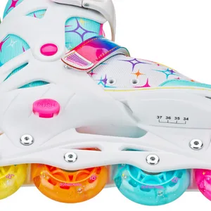 Stryde Adjustable Youth Inline Skates with Light Up Wheels Medium White/Teal - Close up of push button adjustable mechanism