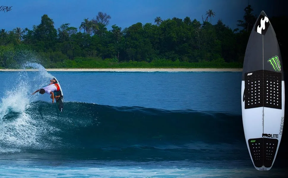 Pro-Lite Surfboard Traction Pad-Cam Richards black/pink & black marble - surfer doing air with front foot traction pad.