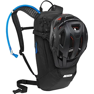 CamelBak M.U.L.E. 12 Mountain Biking Hydration Backpack - Easy Refilling Hydration Backpack - Magnetic Tube Trap 100oz Black - Hydration backpack shown with helmet attached.