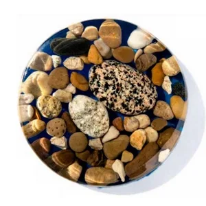West System 105A Epoxy Resin (32 fl oz) Bundle with 206A Slow Epoxy Hardener (7 fl oz). Also Includes one Resin and one Hardener Pump. - Rocks cast in WEST SYSTEM 105 Resin/207 Special Clear Hardener