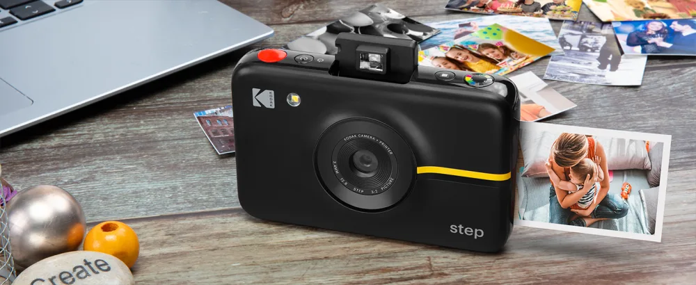Kodak Step Instant Camera with 10MP Image Sensor, Zink Zero Ink Technology (White) Bundle: Photo Album, Case, 20 Pack Zink Paper, Markers, Stickers. Starter Bundle White - zink kodak step camera zink photos