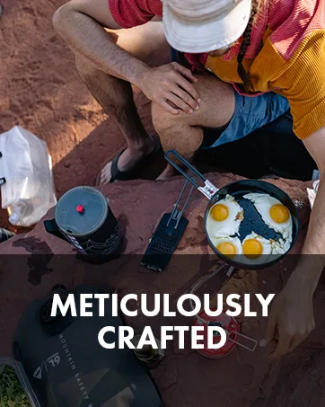MSR MiniWorks EX Backountry Water Filter - Person cooking eggs on a backpacking stove