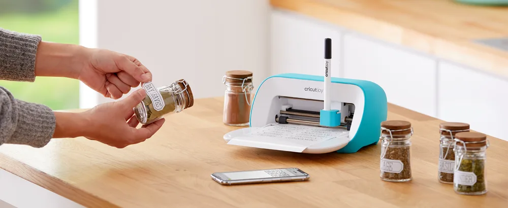 Cricut Joy Machine - A Compact, Portable DIY Smart Machine for Creating Customized Labels, Cards & Crafts, Works with Iron-on, Vinyl, Paper & Smart Materials, Bluetooth-Enabled (iOS/Android/Windows) Machine Joy - Applying sticker to spice jar using a Cricut Joy