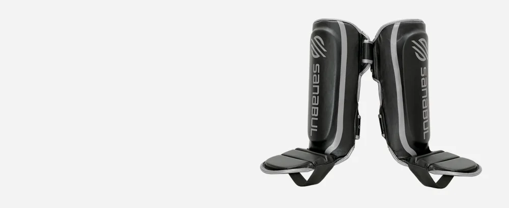 Sanabul Essential Hook and Loop Strap Kickboxing Muay Thai MMA Shin Guards Black S/M - Essential Hook & Loop Shin pads for MMA Kickboxing and Muay Thai