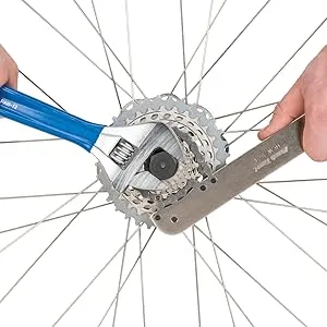 Park Tool FR-5.2GT Cassette Lockring with Tool 12mm Pin - Cassette lockring tool, chain whip and adjustable wrench removing a bicycle cassette lockring