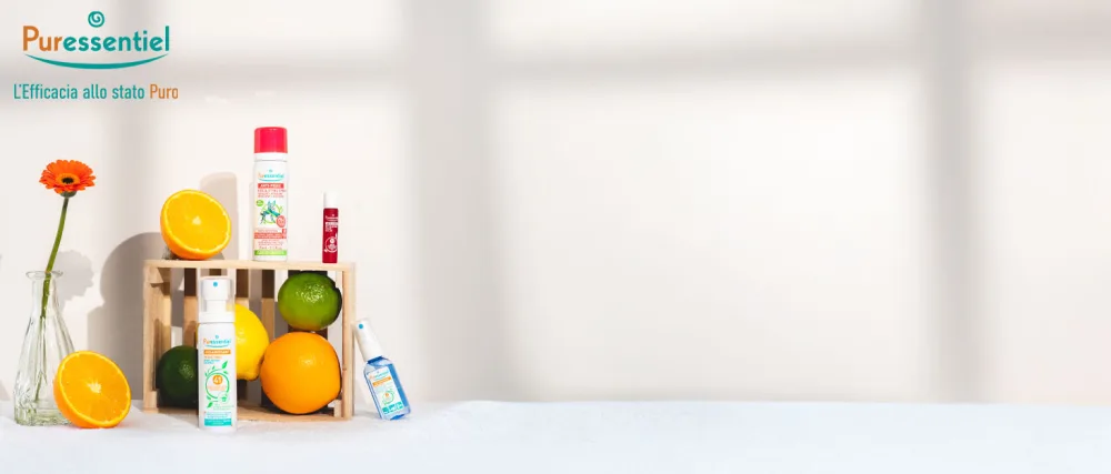 Puressentiel Repulsif Creme 40ml - Kleine drankflessen en -containers, gerangschikt met ijs in een promotionele setting, wat duidt op een uitstalling van koude dranken of versnaperingen.