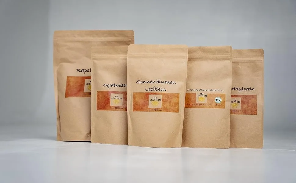  MY LECITHIN Liquid rapeseed lecithin 250 g - Cinq sacs en papier kraft de différentes tailles avec des aliments disposés en rangée sur un fond gris.