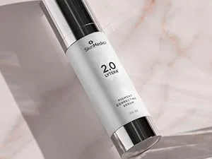 SkinMedica Retinol 1.0 Complex  1 Fl Oz - Lytera 2.0 white bottle on marble backdrop