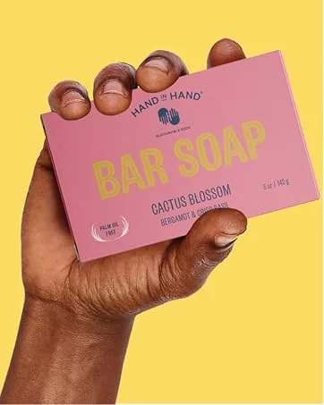 Hand In Hand Bergamot & Crisp Basil Cactus Blossom Hand Soap 10 Fl Oz - hand holding bar soap