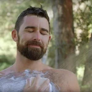 Dr. Squatch Soap Saver Made with Pure Cedarwood That Extends Your Soap's Life 1 Soap Saver - beardy guy scrubbing hairy chest with pine tar soap bar while showering in the woods