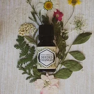 Blessed Herbal Inner Balance Oil - Needed Changes oil on herbs and flowers