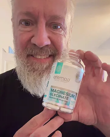 Berberine Supplement with Ceylon Cinnamon HCL 1500mg, Natural Berberine Extract for Metabolic Support & Overall Wellness 120 Capsules - Satisfied customer holding a bottle of Atempo's best-selling supplement: Magnesium Glycinate.