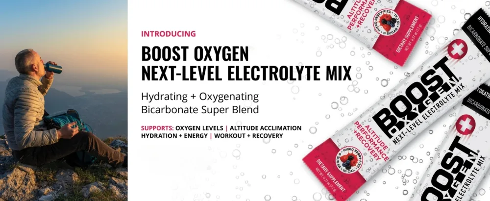 Boost Oxygen Next-Level Hydration Packet | Electrolyte & Bicarbonate Super Blend | Supports Healthy Circulation for Hydration, Oxygenation, Occasional Fatigue & Recovery | Mixed Berry (6 Pack) 0.27 Ounce (Pack of 6) - man on a mountain drinking from a bottle