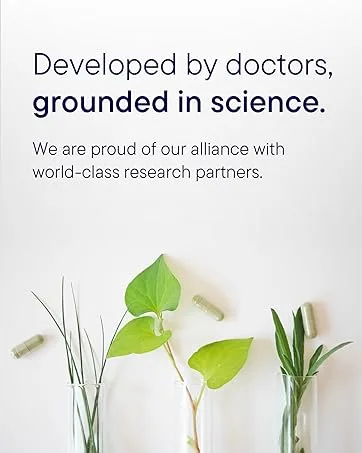 Biotics Research E Mulsion 2 Emulsified Enhanced Absorption Vitamin E Mixed Tocopherols Antioxidant Cardiovascular Health Immune Support 90 Capsules - Capsules and plant leaves in test tubes, emphasizing science-driven, doctor-formulated health