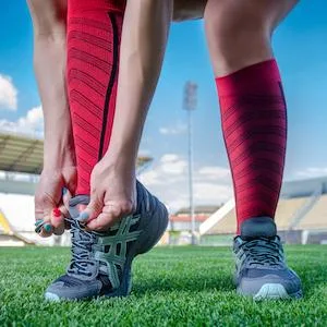 Featherweight Compression Leg Sleeves - Relieve Shin Splints  Calf Strains Large Heather Grey - calf sleeves being worn while training