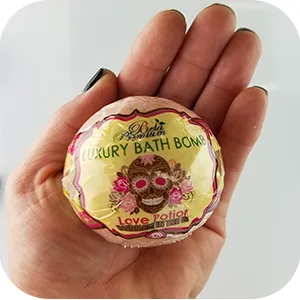 Bela Bath & Beauty  Bela Premium Bath Bombs  Pink Grapefruit  with Moisturizing Shea Butter and Coconut Oil  4.5 oz Each - Set of 8 - Bela Luxury Bath Bomb in hand.