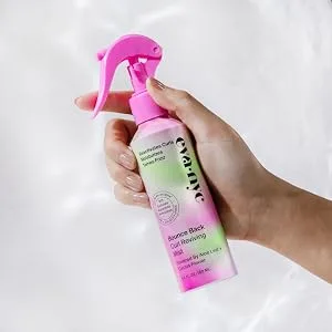 Eva NYC Bounce Back Curl Reviving Mist  5.4 fl oz - hand holding bounce back curl reviving mist