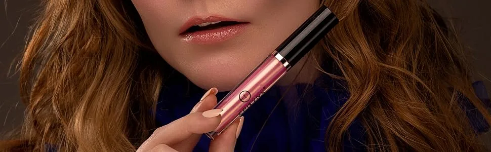 EPILYNX by Dr. Liia Vegan Moisturizing  Long Lasting Lip Gloss - Satin & Glitter - Allergen Free for Sensitive Skin - Neutral Brown - Epilynx lip goss held near lips