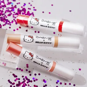 The Cr me Shop x Hello Kitty | Hello Lippy Moisturizing Tinted Lip Balm (Peach Pout) - tinted lip balm