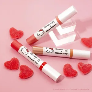 The Cr me Shop x Hello Kitty | Hello Lippy Moisturizing Tinted Lip Balm (Peach Pout) - tinted lip balm