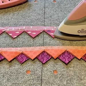 Oliso Multi-Mat Felt Pressing pad - 100% New Zealand Wool  Ideal for Quilting and Sewing (14 x 14     Thick) - Oliso M2Pro pressing Prairie Points on Oliso Multi- Mats