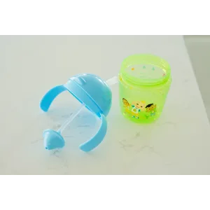 The First Years CoComelon Weighted Straw Cup   Bottle to Cup Transition Toddler Cups   7 Oz   6 Months and Up - image